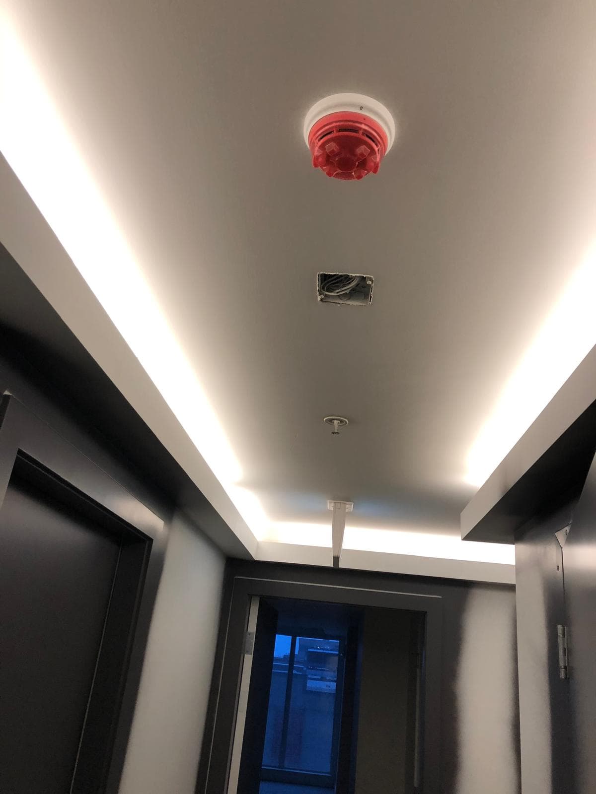 Calgary electrician corridor LED cove lighting and smoke detector installation