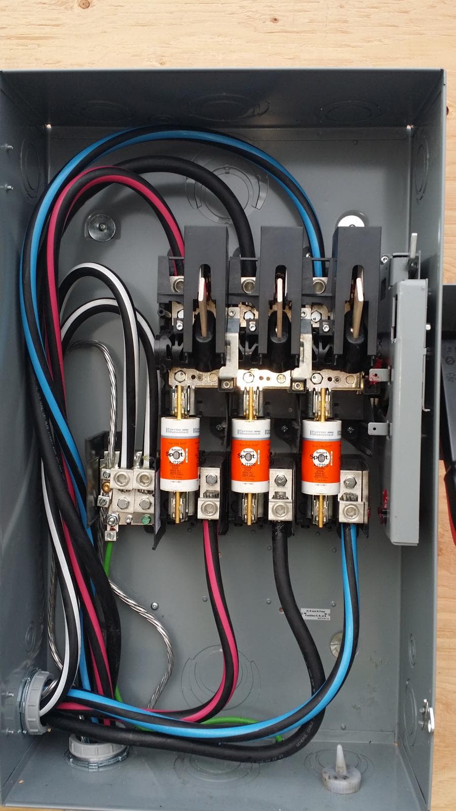 Calgary electrician outdoor disconnect panel wiring installation