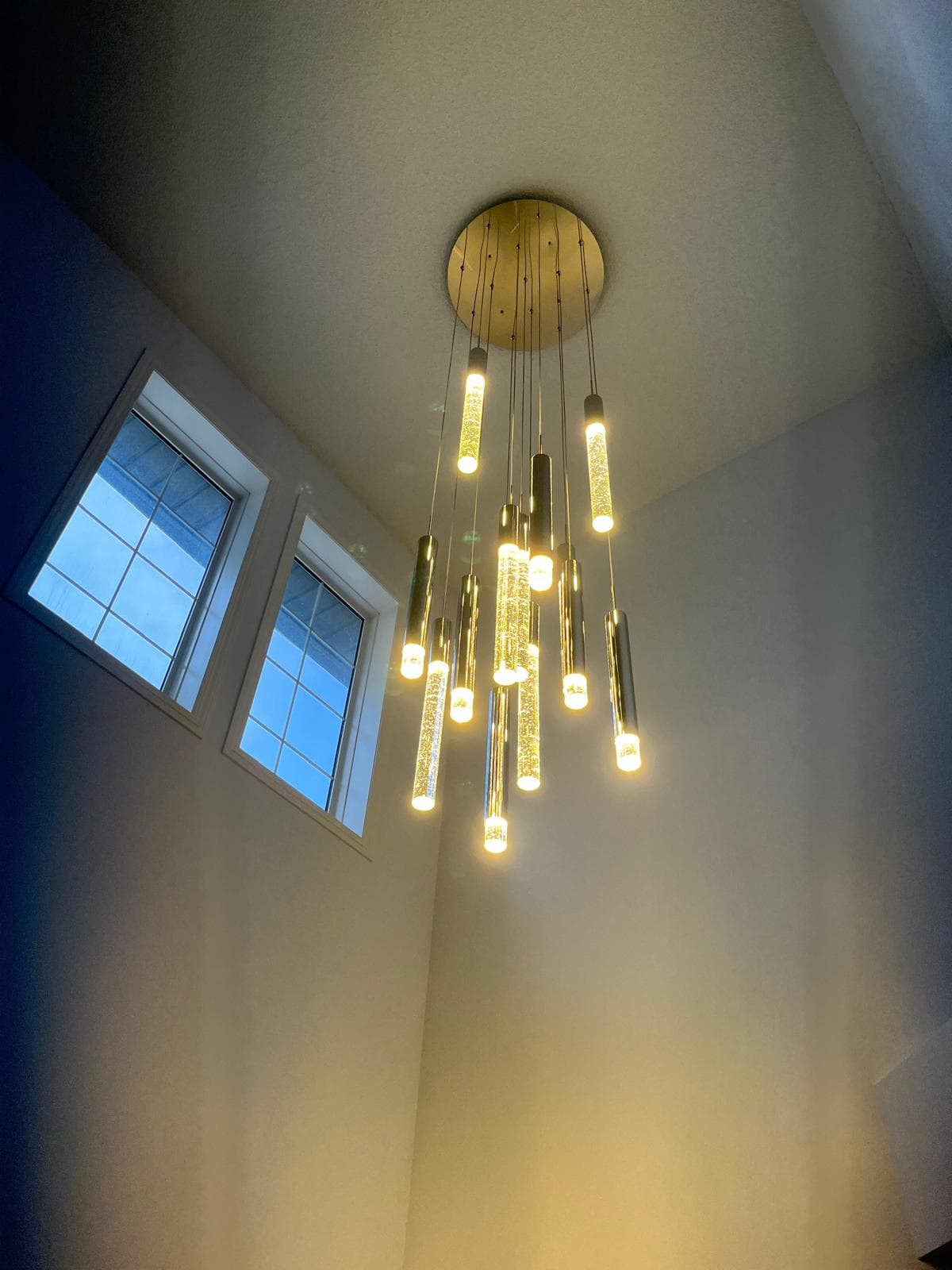 Calgary electrician residential stairwell crystal bubble chandelier installation